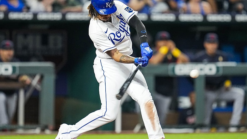 Sep 1, 2021; Kansas City, Missouri, USA; Kansas City Royals designated hitter Adalberto Mondesi (27) hits a home run against the Cleveland Indians during the fourth inning at Kauffman Stadium. Mandatory Credit: Jay Biggerstaff-USA TODAY Sports