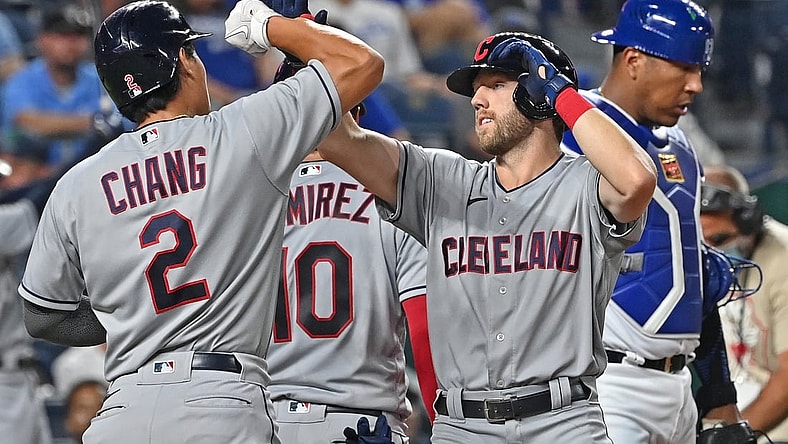 Sep 2, 2021; Kansas City, Missouri, USA;  Cleveland Indians second baseman Owen Miller (6) celebrates with Yu Chang (2) after hitting a three run home run during the fifth inning against the Kansas City Royals at Kauffman Stadium. Mandatory Credit: Peter Aiken-USA TODAY Sports