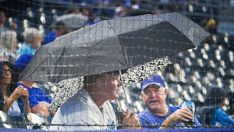 Sep 3, 2021; Kansas City, Missouri, USA; Kansas City Royals fans watch the field while waiting out a rain delay before a game against the Chicago White Sox at Kauffman Stadium. Mandatory Credit: Denny Medley-USA TODAY Sports
