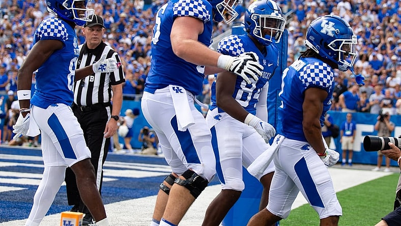 Sep 4, 2021; Lexington, Kentucky, USA; The Kentucky Wildcats offense celebrates a touchdown scored by wide receiver Wan'Dale Robinson (1) during the second quarter against the Louisiana-Monroe Warhawks at Kroger Field. Mandatory Credit: Jordan Prather-USA TODAY Sports