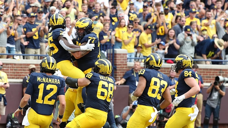 Michigan running back Blake Corum celebrates with teammates after his touchdown against Western Michigan during the first half in Ann Arbor on Saturday, Sept. 4, 2021.

Mich West