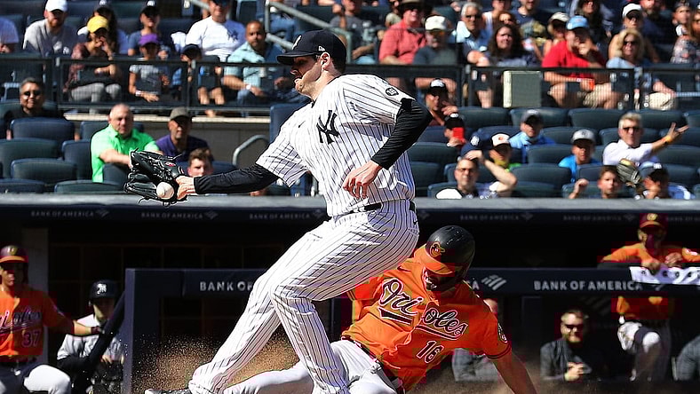 Sep 4, 2021; Bronx, New York, USA; Baltimore Orioles designated hitter Trey Mancini (16) scores a run on a wild pitch as y47 drops the ball during the fourth inning at Yankee Stadium. Mandatory Credit: Andy Marlin-USA TODAY Sports