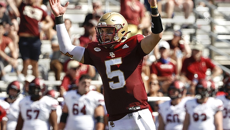 Sep 4, 2021; Chestnut Hill, Massachusetts, USA; Boston College Eagles quarterback Phil Jurkovec (5) celebrates a touchdown against the Colgate Raiders during the second half at Alumni Stadium. Mandatory Credit: Winslow Townson-USA TODAY Sports