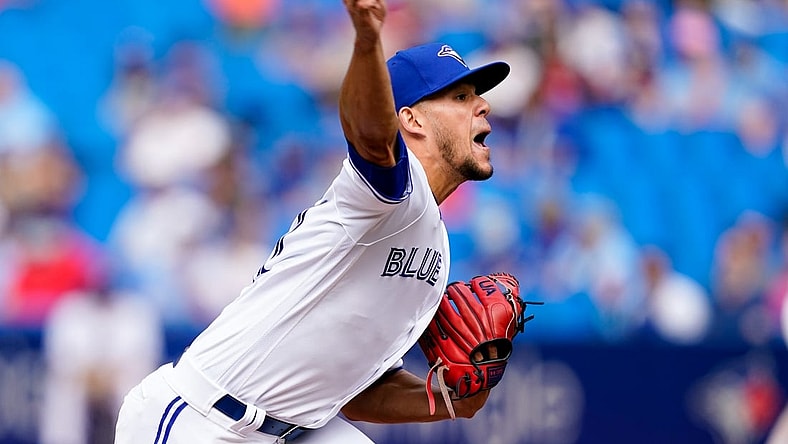 Sep 4, 2021; Toronto, Ontario, CAN; Toronto Blue Jays starting pitcher Jose Berrios (17) pitches to the Oakland Athletics during the first inning at Rogers Centre. Mandatory Credit: Kevin Sousa-USA TODAY Sports