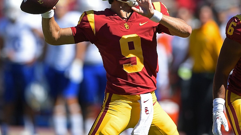 Sep 4, 2021; Los Angeles, California, USA;   USC Trojans quarterback Kedon Slovis (9) sets to pass in the first half of the game against the San Jose State Spartans at United Airlines Field at Los Angeles Memorial Coliseum. Mandatory Credit: Jayne Kamin-Oncea-USA TODAY Sports