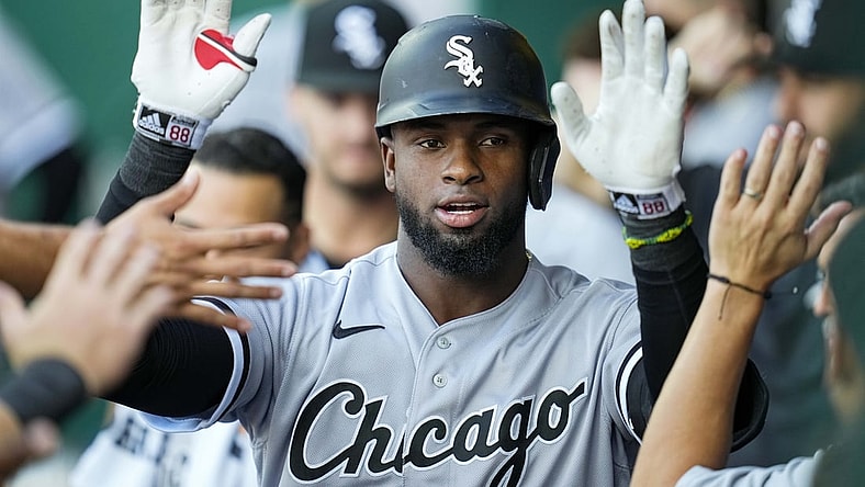 Sep 4, 2021; Kansas City, Missouri, USA; Chicago White Sox center fielder Luis Robert (88) is congratulated after hitting a home run against the Kansas City Royals during the first inning at Kauffman Stadium. Mandatory Credit: Jay Biggerstaff-USA TODAY Sports