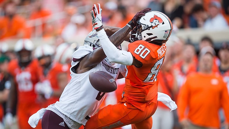 Sep 4, 2021; Stillwater, Oklahoma, USA;  Missouri State Bears safety Kyriq McDonald (6) breaks up a pass intended for Oklahoma State Cowboys wide receiver Brennan Presley (80) during the second quarter at Boone Pickens Stadium. Mandatory Credit: Brett Rojo-USA TODAY Sports