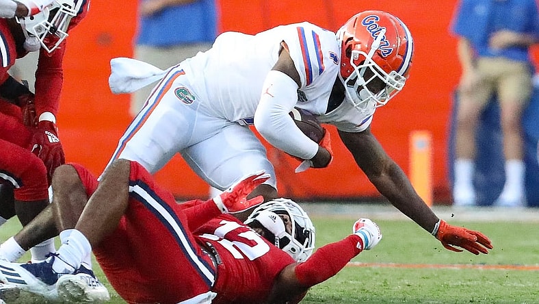 Florida Gators wide receiver Jacob Copeland (1) is brought down after making a catch during a game against the Florida Atlantic Owls at Ben Hill Griffin Stadium in Gainesville Fla. Sept. 4, 2021.

UFfauGameAction22
