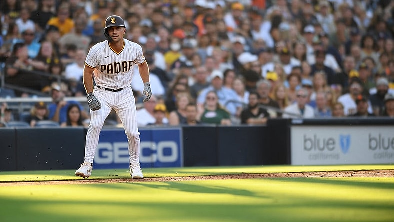 Sep 4, 2021; San Diego, California, USA; San Diego Padres second baseman Adam Frazier (12) leads off third base during the second inning against the Houston Astros at Petco Park. Mandatory Credit: Orlando Ramirez-USA TODAY Sports