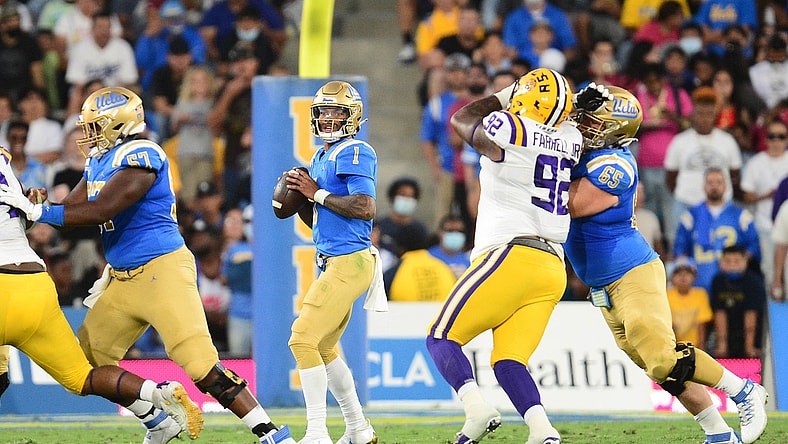 Sep 4, 2021; Pasadena, California, USA; UCLA Bruins quarterback Dorian Thompson-Robinson (1) drops back to pass against the Louisiana State Tigers during the first half the at the Rose Bowl. Mandatory Credit: Gary A. Vasquez-USA TODAY Sports