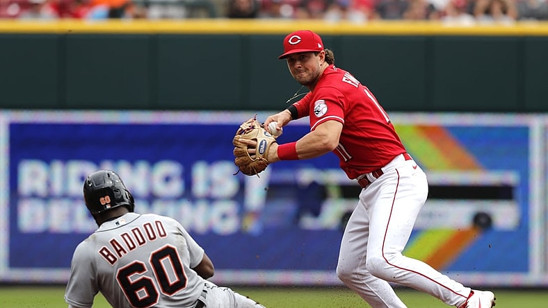 Sep 5, 2021; Cincinnati, Ohio, USA; Detroit Tigers center fielder Akil Baddoo (60) is forced out at second base against Cincinnati Reds shortstop Kyle Farmer (17) during the third inning at Great American Ball Park. Mandatory Credit: David Kohl-USA TODAY Sports