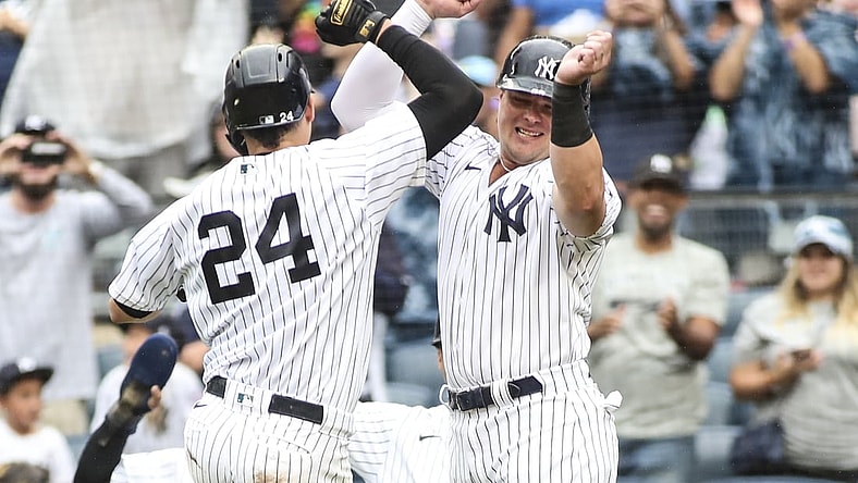 Sep 5, 2021; Bronx, New York, USA;  New York Yankees catcher Gary Sanchez (24) is greeted by designated hitter Luke Voit (59) after hitting a grand slam home run in the second inning against the Baltimore Orioles at Yankee Stadium. Mandatory Credit: Wendell Cruz-USA TODAY Sports