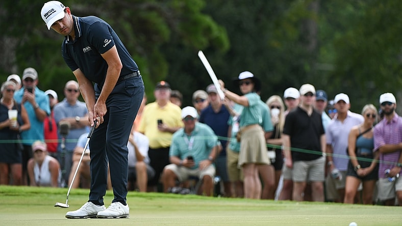 Sep 5, 2021; Atlanta, Georgia, USA; Patrick Cantlay putts on the 7th hole during the final round of the Tour Championship golf tournament. Mandatory Credit: Adam Hagy-USA TODAY Sports