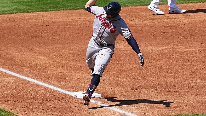Sep 5, 2021; Denver, Colorado, USA; Atlanta Braves left fielder Adam Duvall (14) reacts to his three run home run in the third inning against the Colorado Rockies at Coors Field. Mandatory Credit: Ron Chenoy-USA TODAY Sports