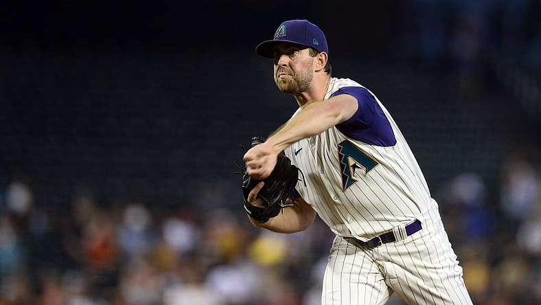 Sep 5, 2021; Phoenix, Arizona, USA; Arizona Diamondbacks starting pitcher Tyler Gilbert (49) pitches against the Seattle Mariners during the first inning at Chase Field. Mandatory Credit: Joe Camporeale-USA TODAY Sports