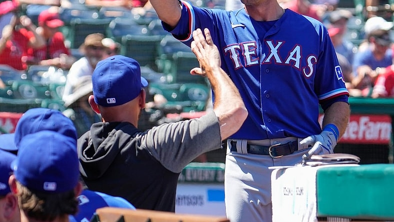 Sep 5, 2021; Anaheim, California, USA; Texas Rangers designated hitter DJ Peters (38) celebrates hitting a solo home run in the second inning against the Los Angeles Angels at Angel Stadium. Mandatory Credit: Robert Hanashiro-USA TODAY Sports