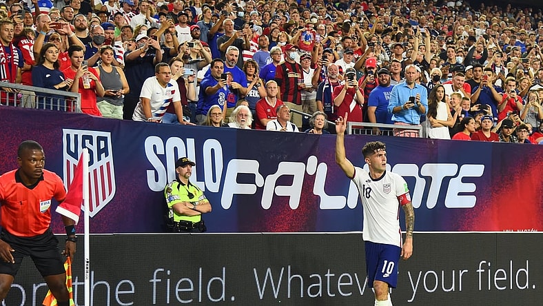 Sep 5, 2021; Nashville, Tennessee, USA; United States midfielder Christian Pulisic (10) on a corner kick in the first half against Canada during a CONCACAF FIFA World Cup Qualifier soccer match at Nissan Stadium. Mandatory Credit: Christopher Hanewinckel-USA TODAY Sports