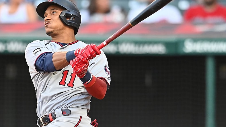 Sep 6, 2021; Cleveland, Ohio, USA; Minnesota Twins second baseman Jorge Polanco (11) hits a home run against the Cleveland Indians during the third inning at Progressive Field. Mandatory Credit: Ken Blaze-USA TODAY Sports