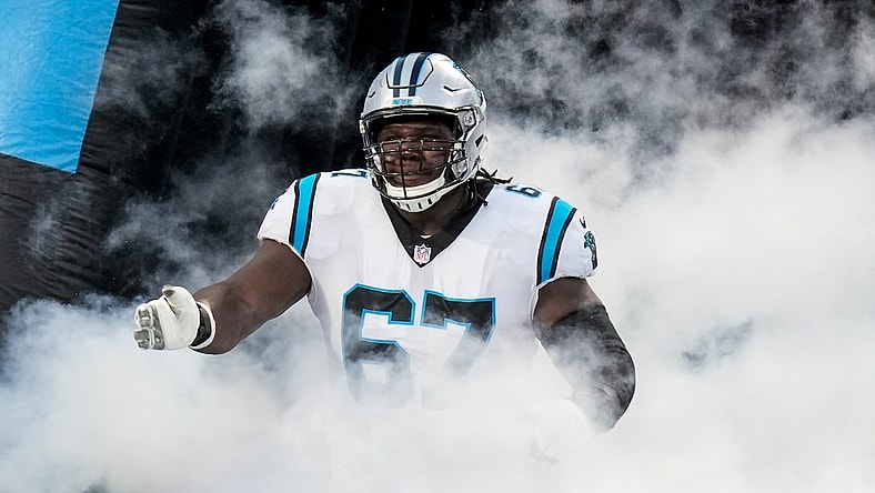 Aug 27, 2021; Charlotte, North Carolina, USA; Carolina Panthers offensive guard John Miller (67) runs onto the field during the first quarter against the Pittsburgh Steelers at Bank of America Stadium. Mandatory Credit: Jim Dedmon-USA TODAY Sports
