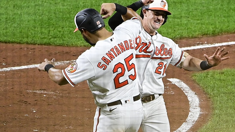 Sep 7, 2021; Baltimore, Maryland, USA;  Baltimore Orioles right fielder Austin Hays (21) celebrates with right fielder Anthony Santander (25)after hitting a two run home run ion the third inning against the Kansas City Royals  at Oriole Park at Camden Yards. Mandatory Credit: Tommy Gilligan-USA TODAY Sports