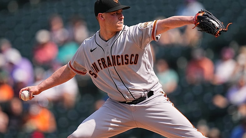 Sep 8, 2021; Denver, Colorado, USA; San Francisco Giants starting pitcher Anthony DeSclafani (26) in the first inning against the Colorado Rockies at Coors Field. Mandatory Credit: Ron Chenoy-USA TODAY Sports