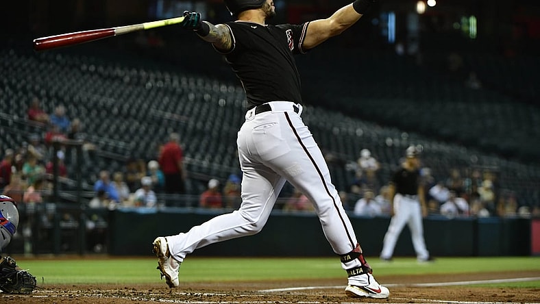 Sep 8, 2021; Phoenix, Arizona, USA; Arizona Diamondbacks left fielder David Peralta (6) hits a solo home run in the second inning against the Texas Rangers  at Chase Field. Mandatory Credit: Matt Kartozian-USA TODAY Sports