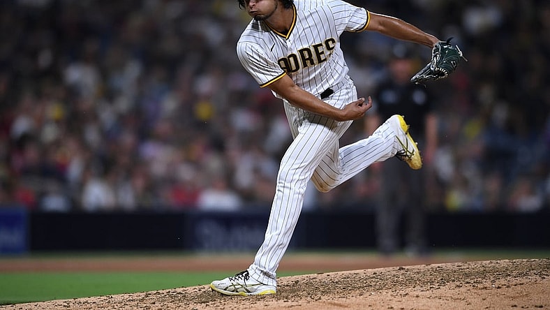 Sep 8, 2021; San Diego, California, USA; San Diego Padres starting pitcher Yu Darvish (11) throws a pitch against the Los Angeles Angels during the sixth inning at Petco Park. Mandatory Credit: Orlando Ramirez-USA TODAY Sports