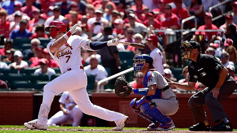 Sep 9, 2021; St. Louis, Missouri, USA;  St. Louis Cardinals catcher Andrew Knizner (7) hits a one run double during the second inning against the Los Angeles Dodgers at Busch Stadium. Mandatory Credit: Jeff Curry-USA TODAY Sports