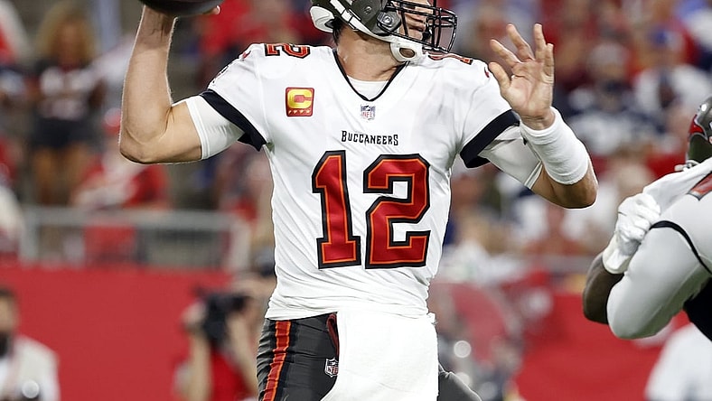 Sep 9, 2021; Tampa, Florida, USA; Tampa Bay Buccaneers quarterback Tom Brady (12) throws the ball against the Dallas Cowboys during the first half at Raymond James Stadium. Mandatory Credit: Kim Klement-USA TODAY Sports