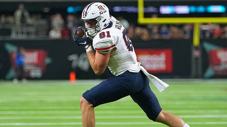 Sep 4, 2021; Paradise, Nevada, USA; Arizona Wildcats tight end Bryce Wolma (81) looks upfield after making a catch against the Brigham Young Cougars at Allegiant Stadium. Mandatory Credit: Stephen R. Sylvanie-USA TODAY Sports