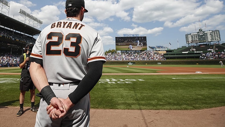 Sep 10, 2021; Chicago, Illinois, USA; San Francisco Giants third baseman Kris Bryant (23) watches a video tribute to him before a baseball game against the Chicago Cubs at Wrigley Field. Mandatory Credit: Kamil Krzaczynski-USA TODAY Sports