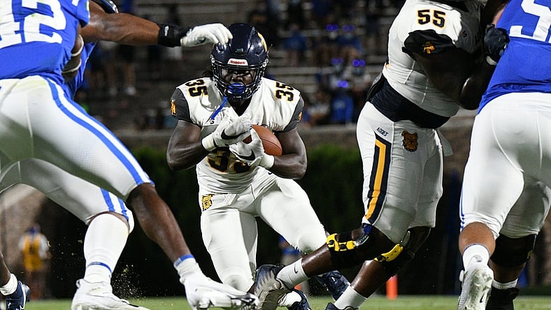 Sep 10, 2021; Durham, North Carolina, USA; North Carolina A&T Aggies running back Fredderick Graves (35) runs against the Duke Blue Devils during the first quarter at Wallace Wade Stadium. Mandatory Credit: William Howard-USA TODAY Sports