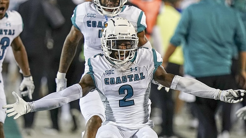 Sep 10, 2021; Conway, South Carolina, USA; Coastal Carolina Chanticleers cornerback D'Jordan Strong (2) celebrates an interception against the Kansas Jayhawks  at Brooks Stadium. Mandatory Credit: David Yeazell-USA TODAY Sports