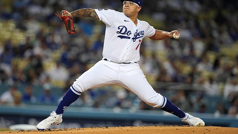 Sep 10, 2021; Los Angeles, California, USA; Los Angeles Dodgers starting pitcher Julio Urias (7) delivers a pitch in the first inning against the San Diego Padres at Dodger Stadium. Mandatory Credit: Kirby Lee-USA TODAY Sports