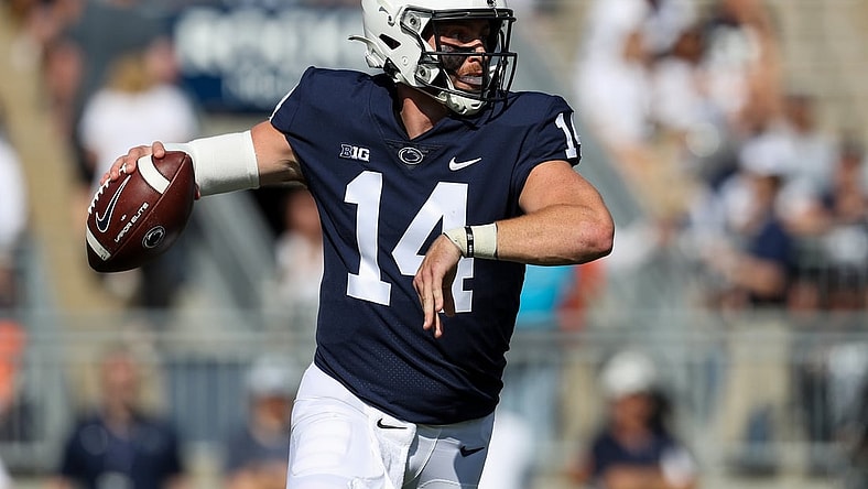 Sep 11, 2021; University Park, Pennsylvania, USA; Penn State Nittany Lions quarterback Sean Clifford (14) throws a pass during the first quarter against the Ball State Cardinals at Beaver Stadium. Mandatory Credit: Matthew OHaren-USA TODAY Sports