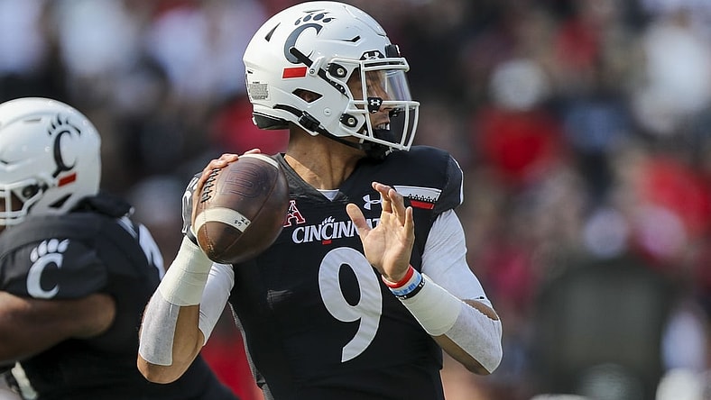Sep 11, 2021; Cincinnati, Ohio, USA; Cincinnati Bearcats quarterback Desmond Ridder (9) throws a pass against the Murray State Racers in the first half at Nippert Stadium. Mandatory Credit: Katie Stratman-USA TODAY Sports