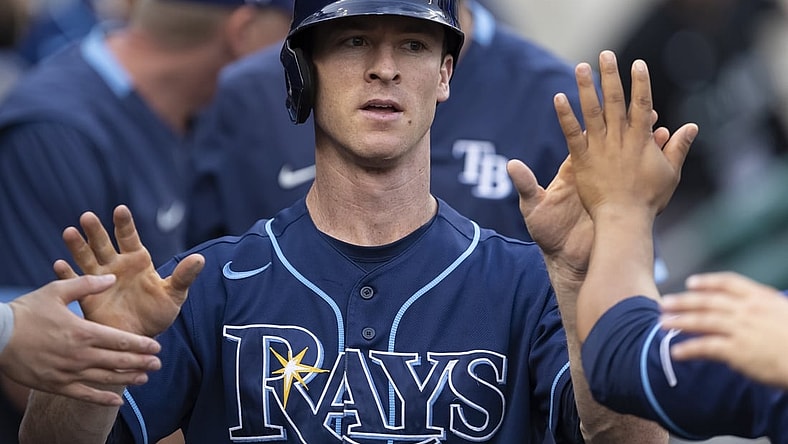 Sep 11, 2021; Detroit, Michigan, USA; Tampa Bay Rays third baseman Joey Wendle (18) celebrates with teammates in the dugout after scoring a run during the second inning against the Detroit Tigers at Comerica Park. Mandatory Credit: Raj Mehta-USA TODAY Sports