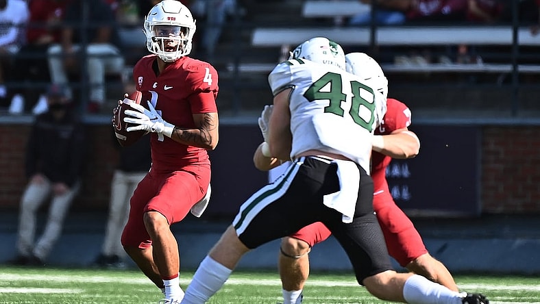 Sep 11, 2021; Pullman, Washington, USA; Washington State Cougars quarterback Jayden de Laura (4) drops back for a pass against the Portland State Vikings in the first half at Gesa Field at Martin Stadium. Mandatory Credit: James Snook-USA TODAY Sports