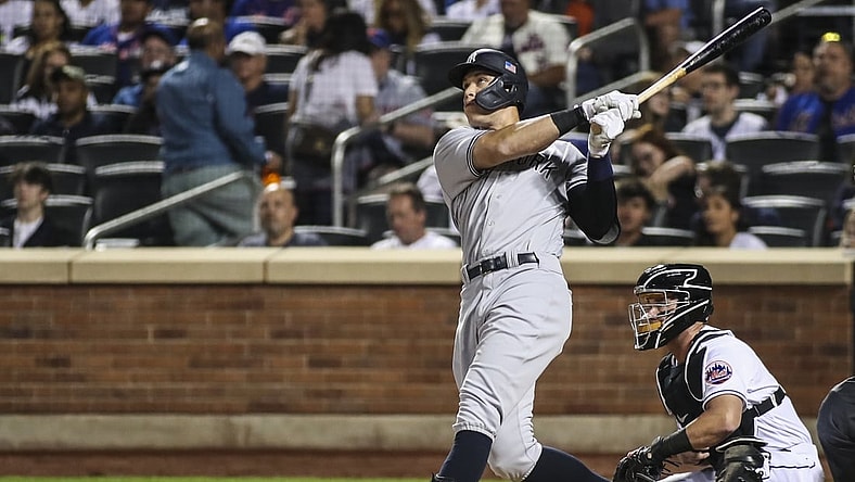 Sep 11, 2021; New York City, New York, USA;  New York Yankees right fielder Aaron Judge (99) hits a solo home run in the second inning against the New York Mets at Citi Field. Mandatory Credit: Wendell Cruz-USA TODAY Sports