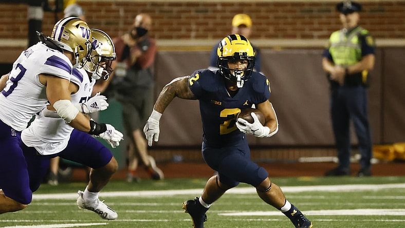 Sep 11, 2021; Ann Arbor, Michigan, USA; Michigan Wolverines running back Blake Corum (2) rushes in the second half against the Washington Huskies at Michigan Stadium. Mandatory Credit: Rick Osentoski-USA TODAY Sports