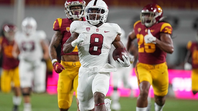 Sep 11, 2021; Los Angeles, California, USA; Stanford Cardinal running back Nathaniel Peat (8) scores on an 87-yard touchdown run against the Southern California Trojans in the first quarter at United Airlines Field at Los Angeles Memorial Coliseum. Mandatory Credit: Kirby Lee-USA TODAY Sports