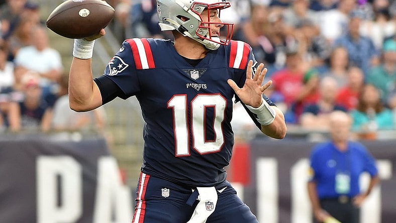 Sep 12, 2021; Foxborough, Massachusetts, USA;  New England Patriots quarterback Mac Jones (10) throws a pass during the second half against the Miami Dolphins at Gillette Stadium. Mandatory Credit: Bob DeChiara-USA TODAY Sports