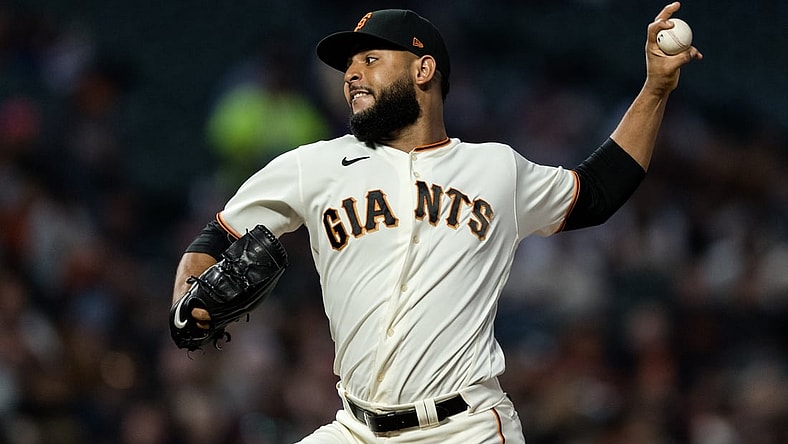 Sep 13, 2021; San Francisco, California, USA; San Francisco Giants relief pitcher Jarlin Garcia (66) throws against the San Diego Padres in the third inning at at Oracle Park. Mandatory Credit: John Hefti-USA TODAY Sports