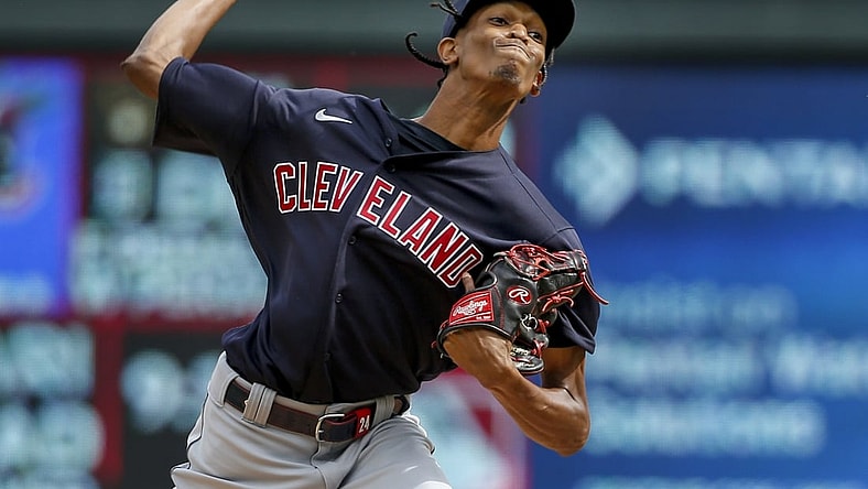 Sep 14, 2021; Minneapolis, Minnesota, USA; Cleveland Indians starting pitcher Triston McKenzie (24) throws to the Minnesota Twins in the second inning at Target Field. Mandatory Credit: Bruce Kluckhohn-USA TODAY Sports