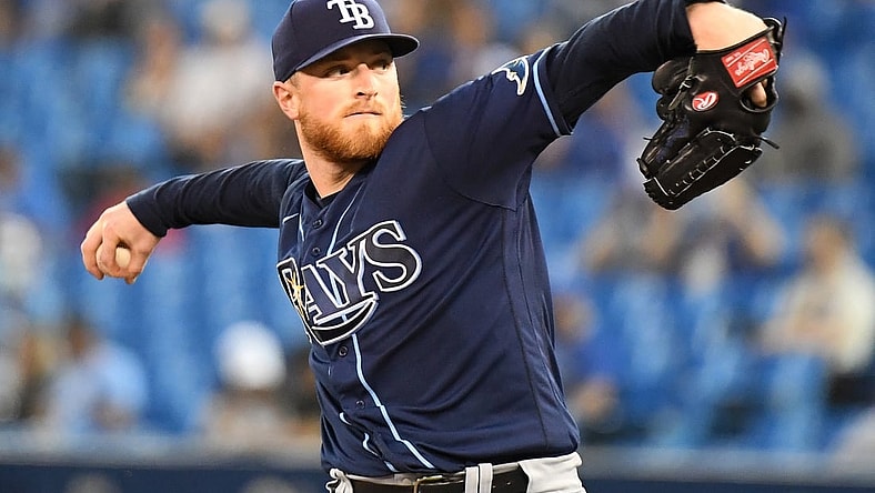 Sep 14, 2021; Toronto, Ontario, CAN; Tampa Bay Rays starting pitcher Drew Rasmussen (57) delivers against the Toronto Blue Jays in the first inning at Rogers Centre. Mandatory Credit: Dan Hamilton-USA TODAY Sports