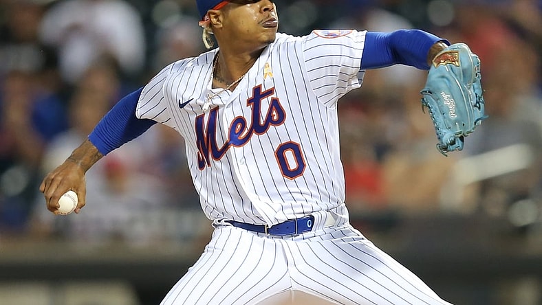 Sep 14, 2021; New York City, New York, USA; New York Mets starting pitcher Marcus Stroman (0) delivers against the St. Louis Cardinals during the first inning at Citi Field. Mandatory Credit: Brad Penner-USA TODAY Sports