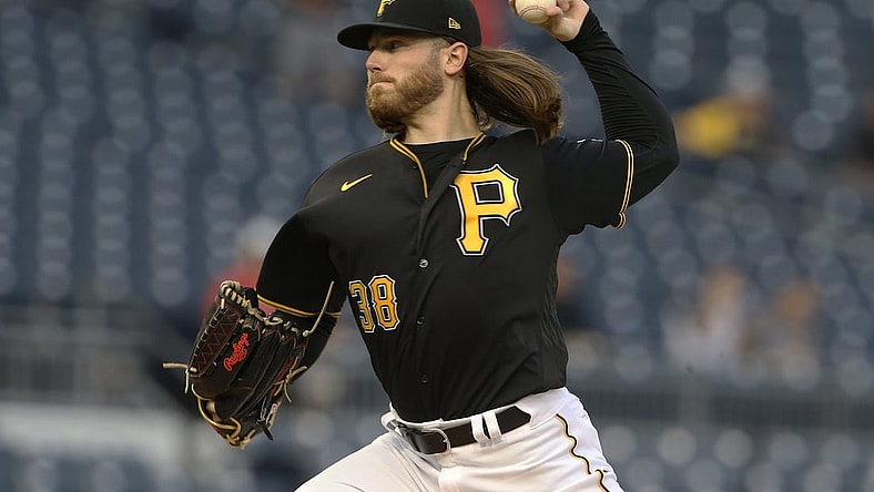 Sep 14, 2021; Pittsburgh, Pennsylvania, USA; Pittsburgh Pirates starting pitcher Dillon Peters (38) delivers against the Cincinnati Reds during the first inning at PNC Park. Mandatory Credit: Charles LeClaire-USA TODAY Sports