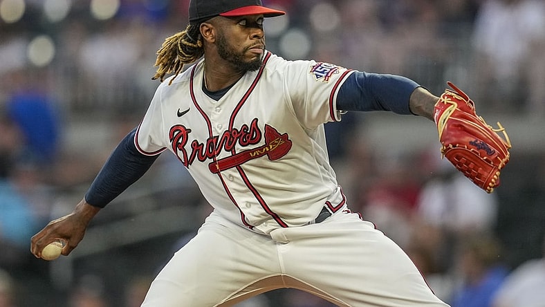 Sep 14, 2021; Cumberland, Georgia, USA; Atlanta Braves starting pitcher Touki Toussaint (62) pitches against the Colorado Rockies during the first inning at Truist Park. Mandatory Credit: Dale Zanine-USA TODAY Sports