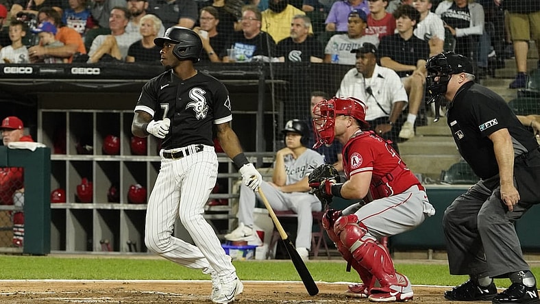 Sep 14, 2021; Chicago, Illinois, USA; Chicago White Sox shortstop Tim Anderson (7) hits a single against the Los Angeles Angels during the second inning at Guaranteed Rate Field. Mandatory Credit: David Banks-USA TODAY Sports