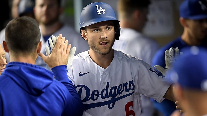 Sep 14, 2021; Los Angeles, California, USA;  Dodgers shortstop Trea Turner (6) celebrates in the dugout after hitting a solo home run against the Arizona Diamondbacks in the fifth inning at Dodger Stadium. Mandatory Credit: Jayne Kamin-Oncea-USA TODAY Sports